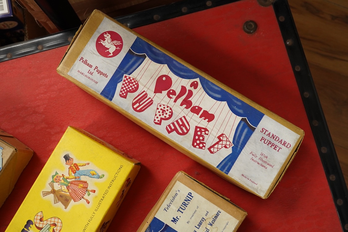 Five boxed Pelham Puppets including; a Type SL Hansel, Gretel, Bembo the Clown, the Policeman with moving mouth, Mr. Turnip